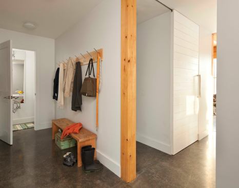 Polished and waxed concrete floors add to the home's thermal mass.