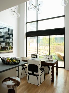 Interiors are as modern as the townhouses' exteriors, with spacious rooms, high ceilings, and ample views to the outdoors.