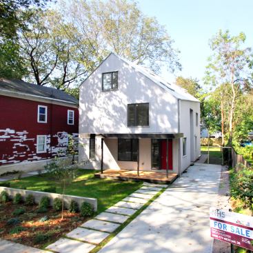 The house at 456 Orchard Street strikes a pose on its New Haven, Conn., block, but its scale and proportion fit with the rest of the neighborhood.