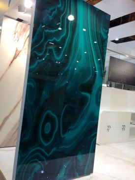 Graniti Fiandre. The Fiandre Precious Stones collection, including Malachite (shown) was an eye-catcher on the show floor. The ceramic material is made with a resinating process to maintain shine and gloss. More 
here.