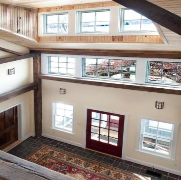 The entry vestibule, centered on the house’s west side, marks the barn's original entrance and helps buffer wintertime winds.