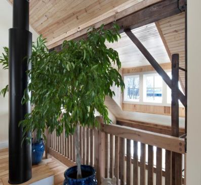 Railings are made of recycled oak and include timber salvaged from the fire.