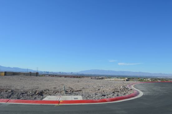 The 0.26-acre lot in the Sky Terrace subdivision overlooks the Las Vegas strip.