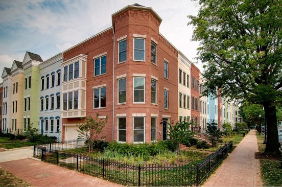 Grand, Multi-Family Housing Project - 30 to 60 du/acre (For Sale or Rent). Builder: EYA. Architect: Lessard Design. Sitting within walking distance of public transportation and retail shops, these Washington, D.C., townhomes have rooftop terraces, bay windows and vibrat paint schemes yet fit right in with the surrounding 19th and 20th century townhouses.