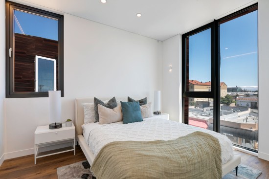 The primary suites, along with the two additional bedrooms, live on the third levels with the laundry.