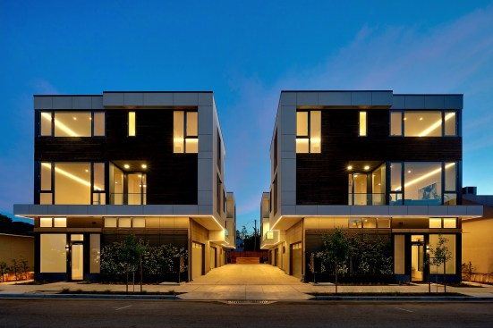 Each unit has its own two-car garage on the first level, along with a dedicated office or flex space.