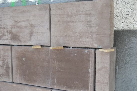 Environmental Stone Works customized the color of its easy-to-install Horizon Panel to match the natural stones found on the New American Home site.