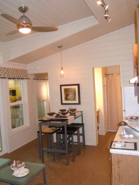 The dining area/living space can be outfitted with cork, bamboo, or maple flooring.