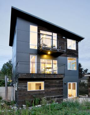The piece that pushes out for the ADU bedroom also frames a patio for that unit’s living room. That patio is adjacent to the deck above, which is an opportunity for that to be shared space describes architect Bradley Khouri."THere's nNo stair from that deck," he adds, " because we the homeowner to have to go back inside to get to the yard."