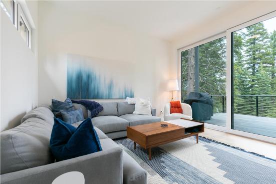 For the plan’s designated flex space, the Aspenwood clients chose to incorporate extra living space for TV watching.