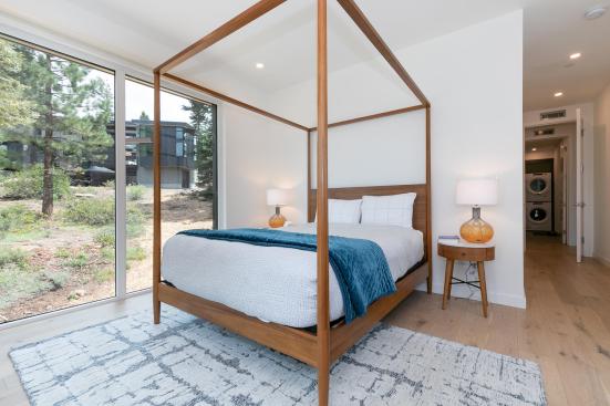 The home’s owner’s suite features a luxurious en suite bathroom and a custom built-in wardrobe.