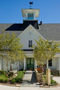 The nearly hidden accessibility in this carriage house-style timber frame home(like the subdle ramp leading to the main entrance) creates a more comfortable atmosphere. Should the owners ever decide to sell, it also means the house will appeal to a wider range of buyers.