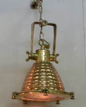 This hanging Cargo light is just one example of the type of nautical- and industrial-style fixtures the company offers. Pieces are made from solid brass, can be used indoors or outdoors, and come in nine finishes. 
shiplights.com/.