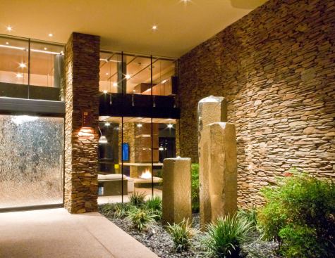 A modern stone entryway puts the emphasis on natural elements, a perfect beginning for the Arizona home which inside focuses on panoramic views of the surrounding desert. Project: Sefcovic Residence, Scottsdale, Ariz.; Architect: Tate Studio Architects, Scottsdale; Builder: Platinum Homes, Scottsdale