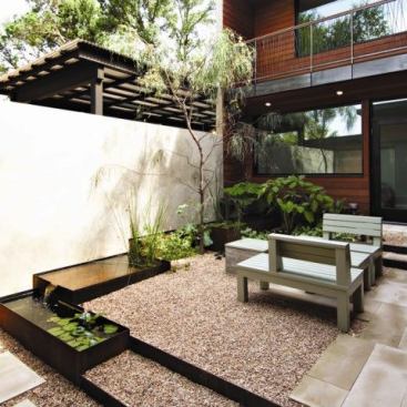 The Post Oak’s C-shaped plan creates a courtyard that responds to the clients’ desires for privacy in their dense neighborhood.