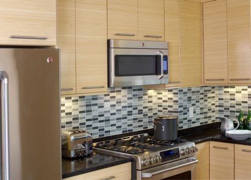 Wilson's clients seek her out for her green expertise. Here she uses bamboo horizontal grain cabinets with a simple design.