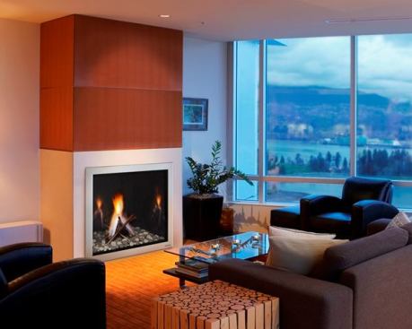 The modern fireplaces trend continues. This one, LUX, is a gas fireplace unit featuring stainless steel construction, modern media in place of traditional logs, steel pipes, and a reflective black glass firebox. A clean face design allows finishing materials to be applied up to the edge of the fireplace and standard sizes—36 inches and 42 inches—make it easier to frame. Heat & Glo by Hearth and Home Technologies. 
www.heatnglo.com.