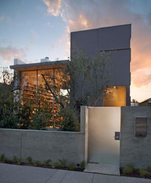 The shelves add an element of color and texture that's partially visible from the street.