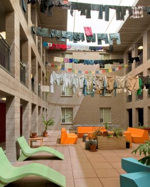 The Gold Standard Laundry hangs drying in the “sustainabiliity room” inside student housing at Barrett Honors College at Arizona State University. This building earned LEED Gold certification.