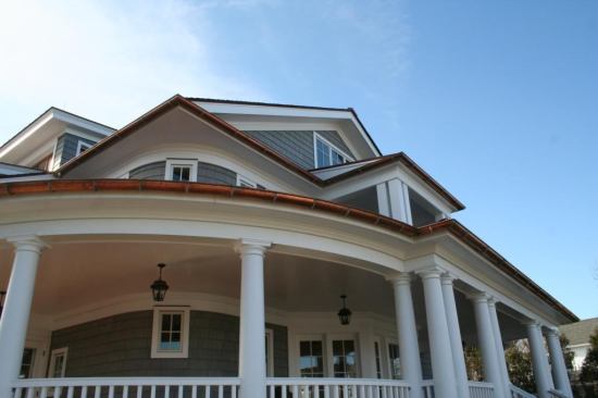 There's a beadboard soffit in the overhangs, along with a woven corner.