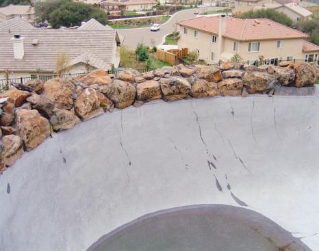 A last-minute design change put this pool farther out on a hillside than expected onto soil that hadnt been prepared. Within six months, the pool exhibited vertical cracks and the coping began to separate from the deck.