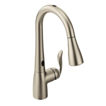 Moen’s MotionSense sensors detect movement in two zones. As a result, to start or stop water flow users may wave a hand above the spout, use the Ready Sensor near the base of the faucet, or use the handle in the traditional manner. It uses six standard AA batteries or AC power. 
www.moen.com/motionsense.