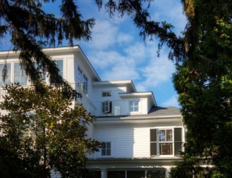 The home is a seamless melding of old and new. “We have a third floor tower that’s glass, and that’s not in any four square I’ve ever seen,” says Moore. The designed the tower to look as if it had always been there and got glassed in over time.