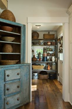 A butler's pantry fitted with open shelves keeps kitchen accessories in easy reach, but out of sight.