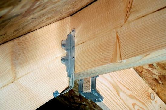 The LRU is the new rafter-to-ridge connection hanger that can accommodate solid-sawn rafters 2x6 to 2x12 in size. Installed with nails or Strong-Drive structural-connector screws, the product slopes up or down to 45 degrees and can be installed either before or after the deck is in place. It will be available in April. Simpson Strong-Tie Co. 
www.strongtie.com.