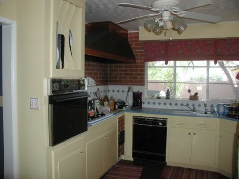 The original kitchen was dated and cramped, made worse by a series of poorly planned rooms that relate neither to the exterior or each other.