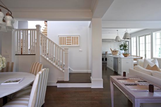 The first-floor plan is open and light-filled.