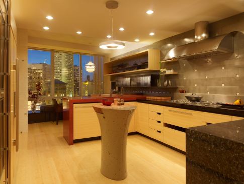 Designer Fu-Tung Cheng’s blend of sleek lines and handcrafted detail turned this condo kitchen from dim and claustrophobic to a warm and inviting place to cook and spend time.