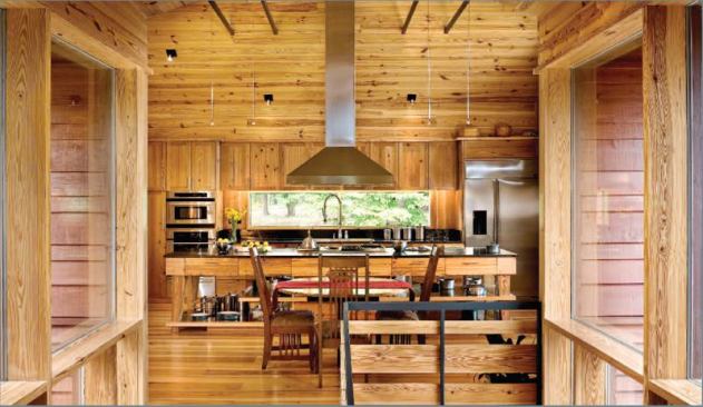 The extensive interior use of knotty pine-much of it reclaimed-creates a warm, casual look.