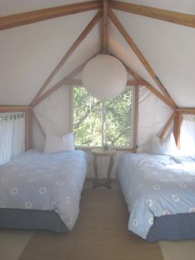 Walls are 7 feet tall, and the roof peaks at 11 feet.