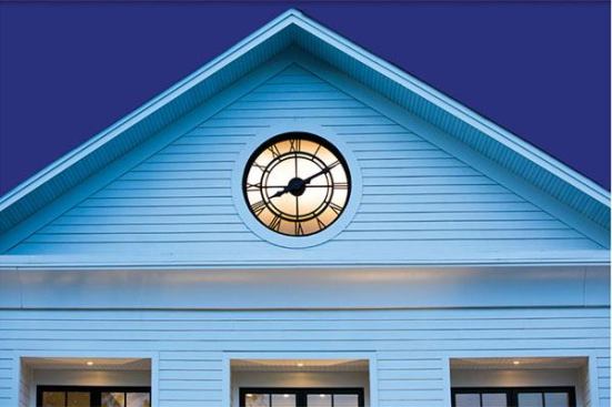 A custom clock graces the center’s façade. Like many of Kensett’s cool features, the clock also serves double duty. It keeps time for the community and serves as the required secondary egress for the guest suite. The entire thing swings open on heavy iron hinges. “I’d never designed a clock before,” McGuinness admits, “but our gate maker created the face, hinges, and latch then we ordered clockworks and glass for both sides so light filters all the way through into the suite—like in Hugo.”