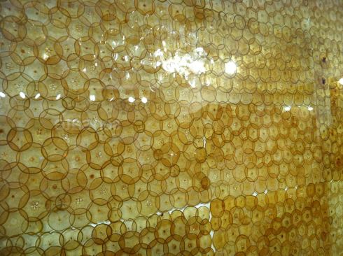 In an industry for which innovation is measured in increments, a little creativity in design can go a long way. Market, a new collection of wall tiles from Ann Sacks, takes it all the way to the produce stand. Designed in collaboration with glass artist Tony Davlin, the series features tissue-thin slices of fruits and vegetables that are dried and pressed between two glass lites. The vivid, near-translucent hues of the overlapping pears (shown), tomatoes, carrots, gourds, citrus fruits, and cucumbers add ocular flavor, turning interior walls into a natural form of eye candy.