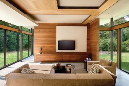 A mix of woods--cedar, oak, and walnut--warms the interiors.
