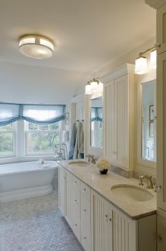 The free-standing tub in the master bath occupies a south-facing bay.