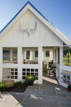 Using blue stone for the walkways helps mask the fact that they are also access ramps.
