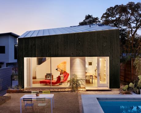 The kitchen and living area are part of the addition, which offers plenty of access to the outdoor spaces.