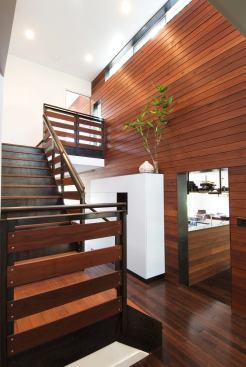 Operable windows at the top of Eva Street’s staircase create a stack effect for passive cooling.
