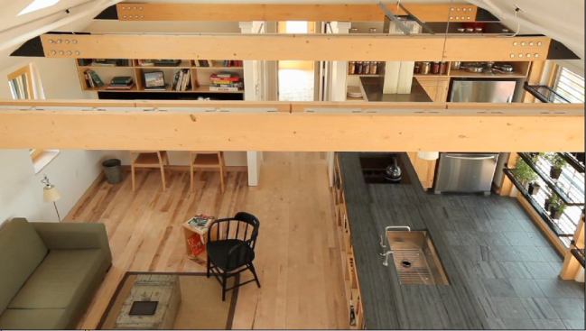 Using the Vermont vernacular, the students distilled the architecture of the New England farmhouse into a pure gable form. The interior features exposed beams.