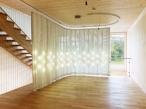 The power-generating, room creating curtains also have LED lighting woven into the material. THe lights are also powered by the DC power track.