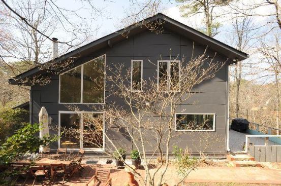 The owners of this 1974 home were looking for an update, both to aesthetics and their home’s overall energy performance. A contemporary kitchen redo met the first need, and upgraded windows and doors throughout the home satisfied the second. Project: The Rebel Valley Project; Location: Vinings, Ga.; Builder: Pinnacle Custom Builders.