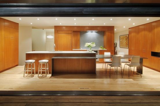 For a formerly cramped kitchen, this 17-foot island unifies and streamlines the space while graciously delineating areas for cooking and eating. Project: Hobson Remodel, Reno, Nev.; Builder: MB Construction, Reno; Architect: Hawkins and Associates, Reno.