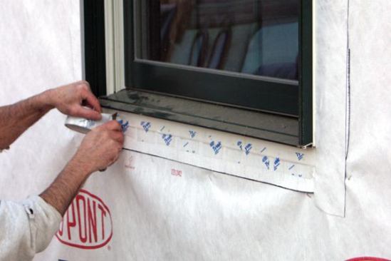 Skip-Tape the Sill FlangeI also skip-tape the bottom (uncaulked) sill flange so that any moisture that gets in can weep out. Skip-taping also limits air leaks, though it's not entirely airtight.