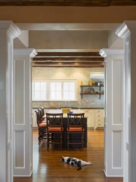Looking east, the kitchen entry is off the main gallery space. The atrium goes all the way up to the third floor.