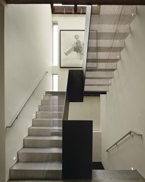 Residential Architect  2011 RADA  Steel Stair, Seattle  Architectural Design Detail / Grand    Stair runs fabricated from folded sheets of perforated steel filter light from a skylight above.