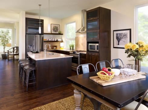 “The average house construction involves 30 to 35 different trades,” says Brian Stamm, manager of production planning at Brookfield. “You have to communicate very clearly to everyone involved,” from draftsmen to component suppliers."