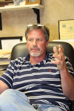 Tom Mayberry in his office on 32nd Street in Joplin.
